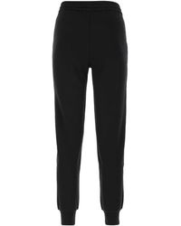 Moncler Track pants and sweatpants for Women - Up to 50% off at Lyst.com