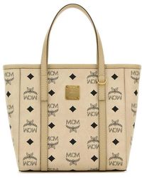 MCM Handbags in Natural | Lyst