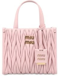 Miu Miu - Matelassé Logo-lettering Mini Tote Bag - Lyst