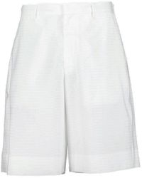 Prada - Triangle-logo Mid-rise Bermuda Shorts - Lyst