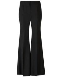 Givenchy - Crepe Flare Trousers - Lyst