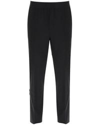 MSGM - Logo-waistband Tapered-leg Stretched Trousers - Lyst