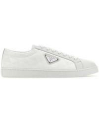 Prada - Triangle-logo Round-toe Lace-up Sneakers - Lyst