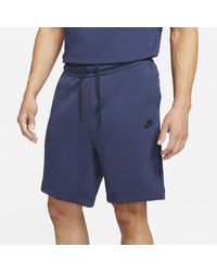 nike tech shorts blue