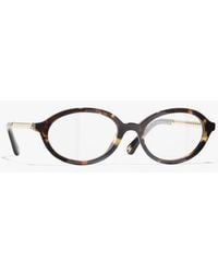 CHANEL - Oval Eyeglasses - Lyst