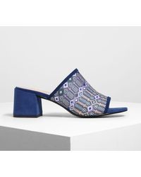 charles and keith purple heels