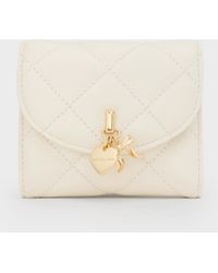 Charles & Keith - Arrietty Quilted Curved-Flap Wallet - Lyst