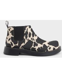 Charles & Keith - Penelope Cow-print Pull-tab Chelsea Boots - Lyst