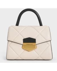 Charles & Keith - Vertigo Two-tone Quilted Trapeze Top Handle Bag - Lyst