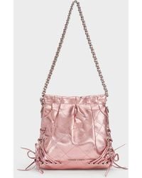 Charles & Keith - Duo Metallic Grommet Chain-Handle Two-Way Backpack - Lyst