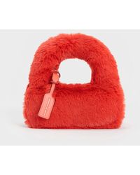 Charles & Keith - Mini Yama Furry Top Handle Bag - Lyst