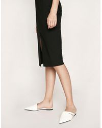 white pointed toe mule