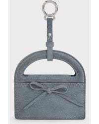 Charles & Keith - Reese Bow Top Handle Wristlet - Lyst