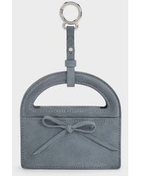 Charles & Keith - Reese Bow Top Handle Wristlet - Lyst