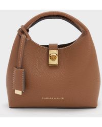 Charles & Keith - Mini Chance Turn-Lock Bucket Bag - Lyst