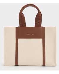 Charles & Keith Mini Daylla Canvas Tote Bag in Natural | Lyst UK