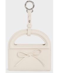 Charles & Keith - Reese Bow Top Handle Wristlet - Lyst