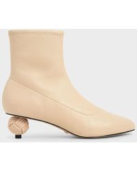 cos sculptural leather ankle boots