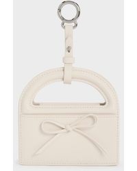 Charles & Keith - Reese Bow Top Handle Wristlet - Lyst