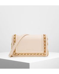 clutch bolsa charles and keith