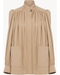 Chloé - コットンギャバジン製ハイネック ギャザージャケット 婦人向け オレンジ サイズ コットン 100% Horn Bubalus Bubalis, Farmed, Coo India - Lyst