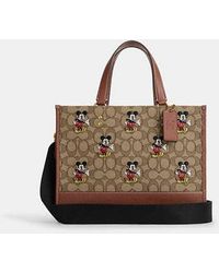 COACH - Disney X Coach Dempsey Carryall Bag With Print | Cotton - Lyst