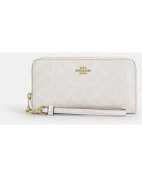 COACH - Long Zip Around Wallet In Signature Canvas - Lyst