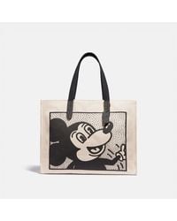 bolsa coach para hombre