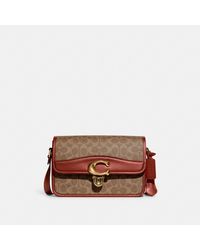 hallie shoulder bolsa in signature canvas red