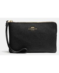 COACH - Corner Zip Wristlet - Lyst