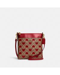 coach aster crossbody with floral frame