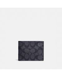 COACH - Slim Billfold Wallet In Signature Canvas - Lyst