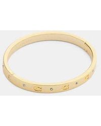 COACH - Repeated C Hinged Bangle - Lyst