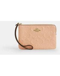 COACH - Corner Zip Wristlet With Charm - Lyst