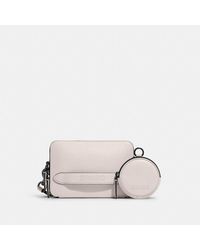 coach rivington pouch