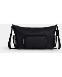 COACH - Finn Crossbody Bag With Pockets - Lyst