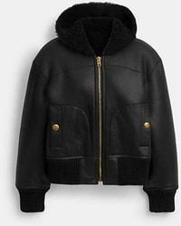 COACH - Reversible Shearling Hoodie - Lyst