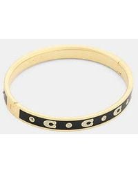 COACH - Repeated C Hinged Bangle - Lyst