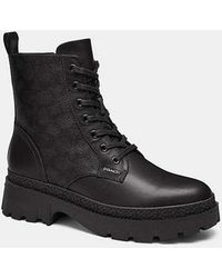 COACH - Lucy Lug Sole Combat Boot With Signature Canvas - Lyst