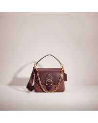 coach camera bolsa 16 with horse and carriage print