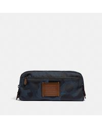 coach suitcases