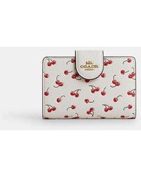 COACH - Medium Corner Zip Wallet With Cherry Print - Lyst