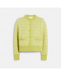 coach yellow sweater