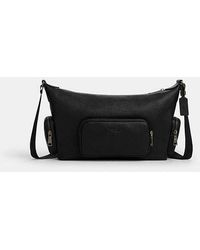 COACH - Finn Crossbody Bag With Pockets - Lyst