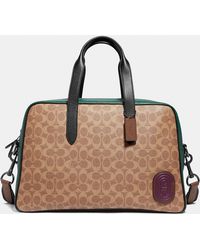 Metropolitan Soft Carryall In Signature Canvas With Patch Natural