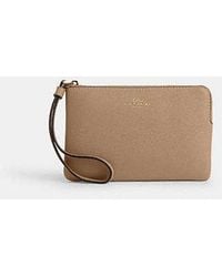 COACH - Corner Zip Wristlet - Lyst