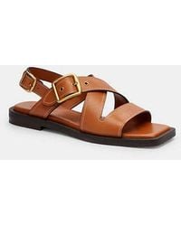 COACH - Sandalias planas con hebilla de archivo - Lyst