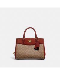 COACH®  Disney X Coach Dempsey Carryall In Signature Canvas With