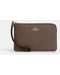 COACH - Corner Zip Wristlet - Lyst