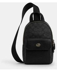 COACH - Small Turnlock Sling Pack - Lyst